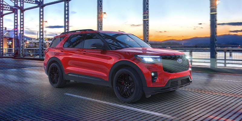 A red Ford Explorer parked on Bridge