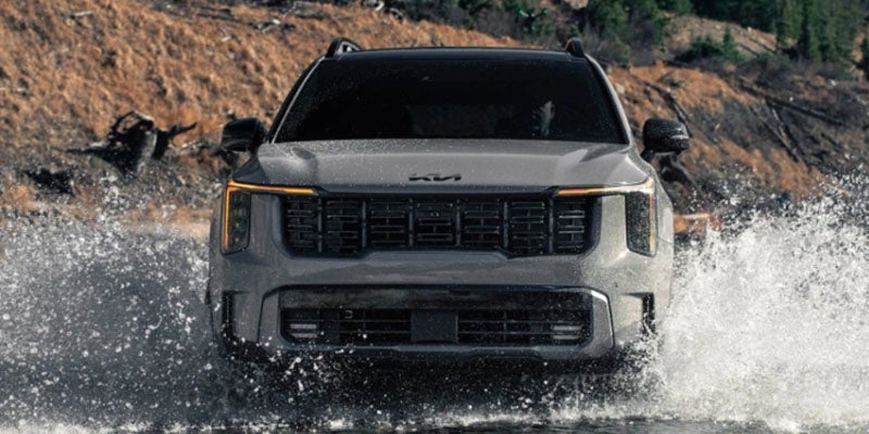 A Kia Sorento Driving in the water